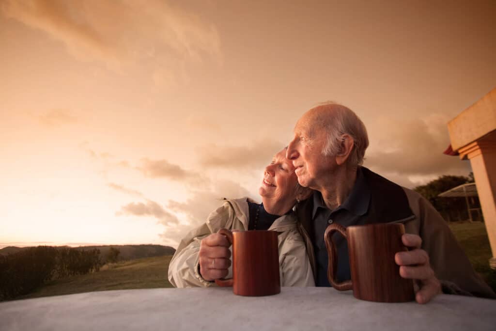 Couple of seniors looking at the sunset
